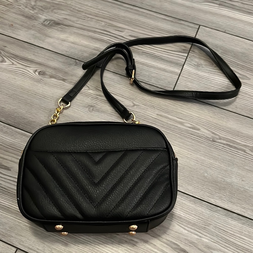 Black cross-body vegan leather bag